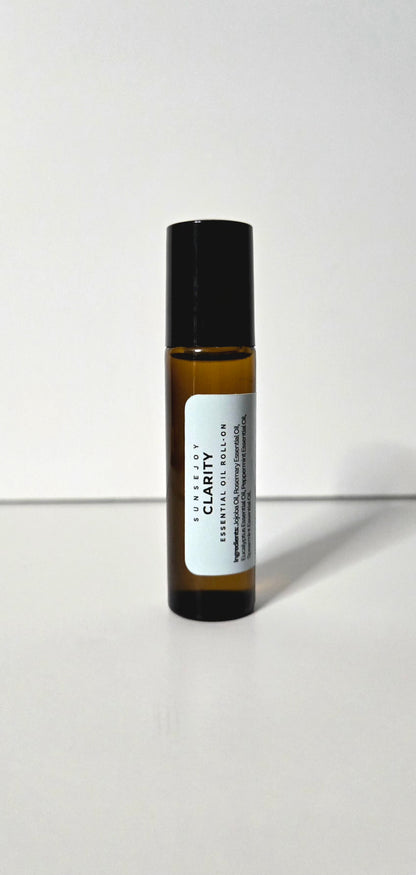Small brown bottle with a black cap on a white background