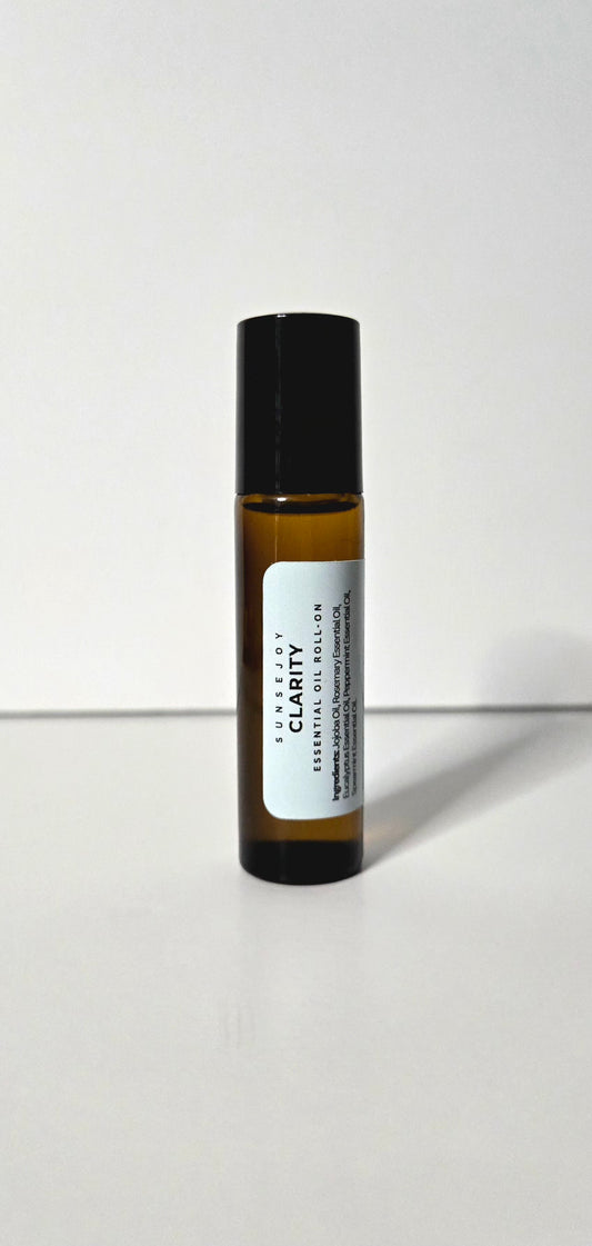 Small brown bottle with a black cap on a white background