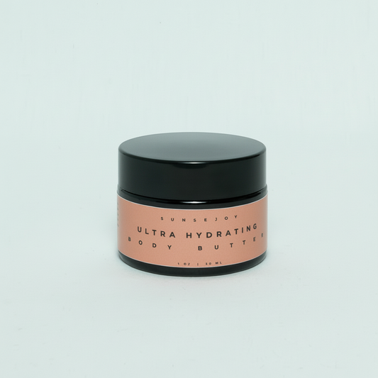 Jar of ultra hydrating body butter with black lid on a light gray background