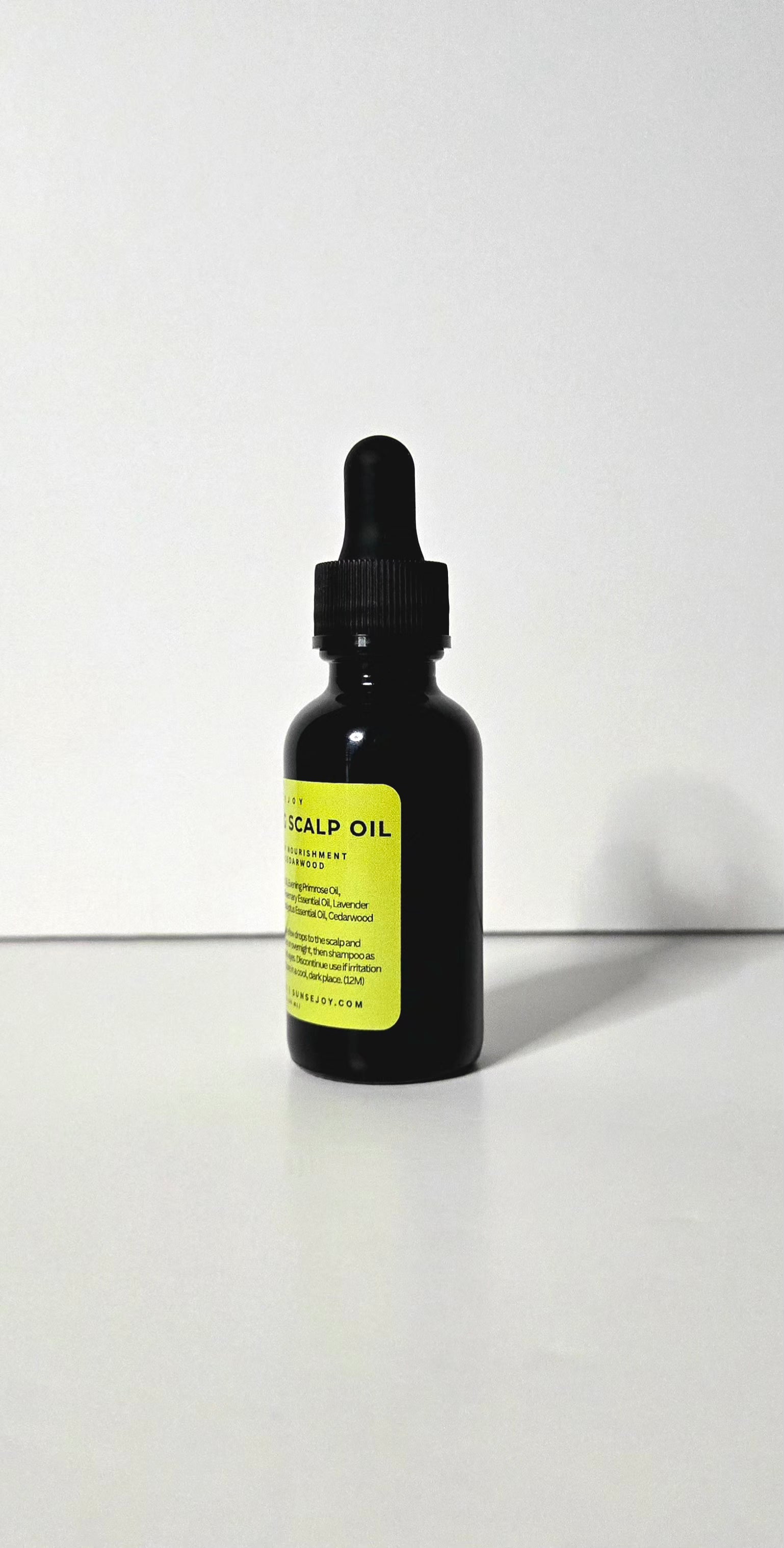 Black dropper bottle labeled 'Niacin Oil' on a white background