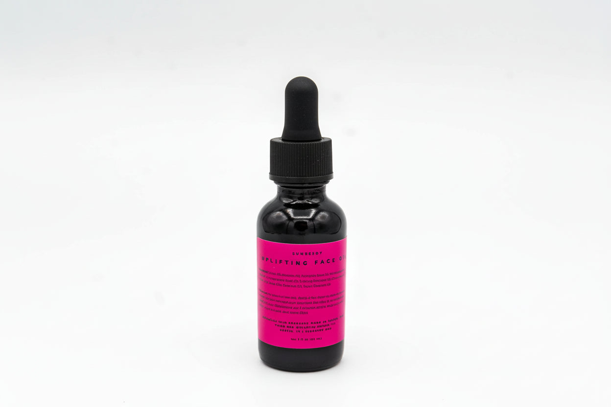 Black bottle with pink label and dropper on a white background