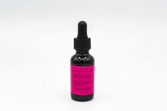 Black bottle with pink label and dropper on a white background